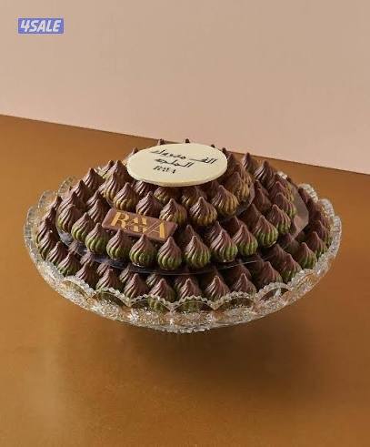 We need a lady to arrange chocolate on trays0