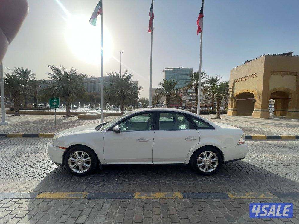 للبيع 2009 فورد صالون ماشي 97 الف صبغ الوكاله فل ابشن1