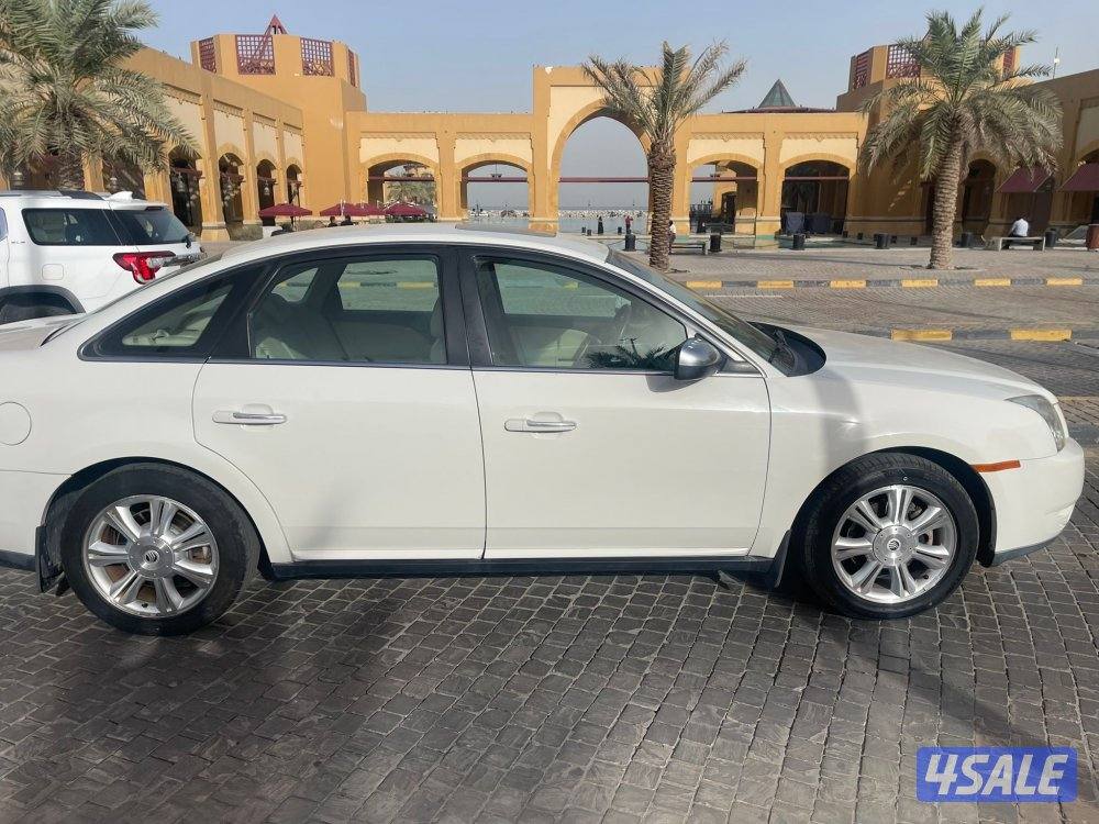 للبيع 2009 فورد صالون ماشي 97 الف صبغ الوكاله فل ابشن2