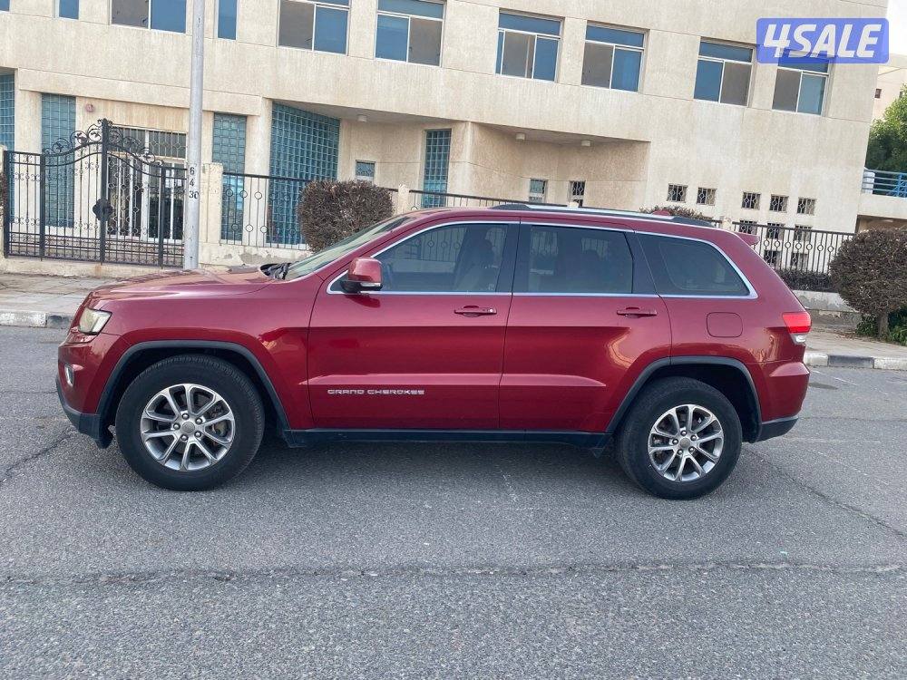 قراند شيروكي لاريدو 2014 صبغ الوكاله عداد270 الف وارد الوكاله 6 سلندر4