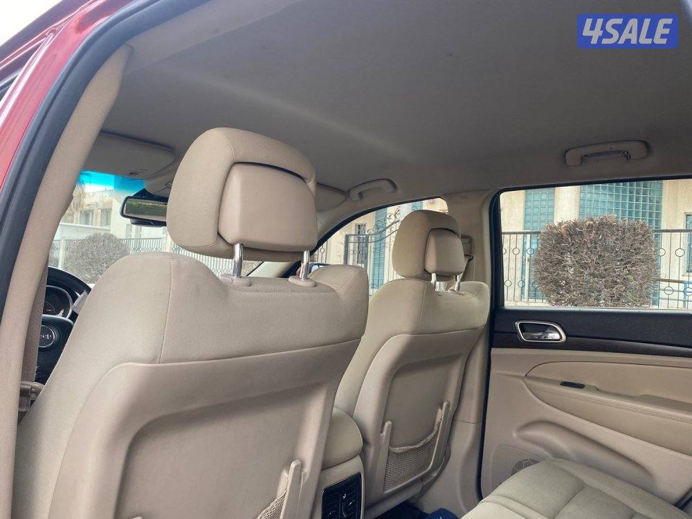 قراند شيروكي لاريدو 2014 صبغ الوكاله عداد270 الف وارد الوكاله 6 سلندر8