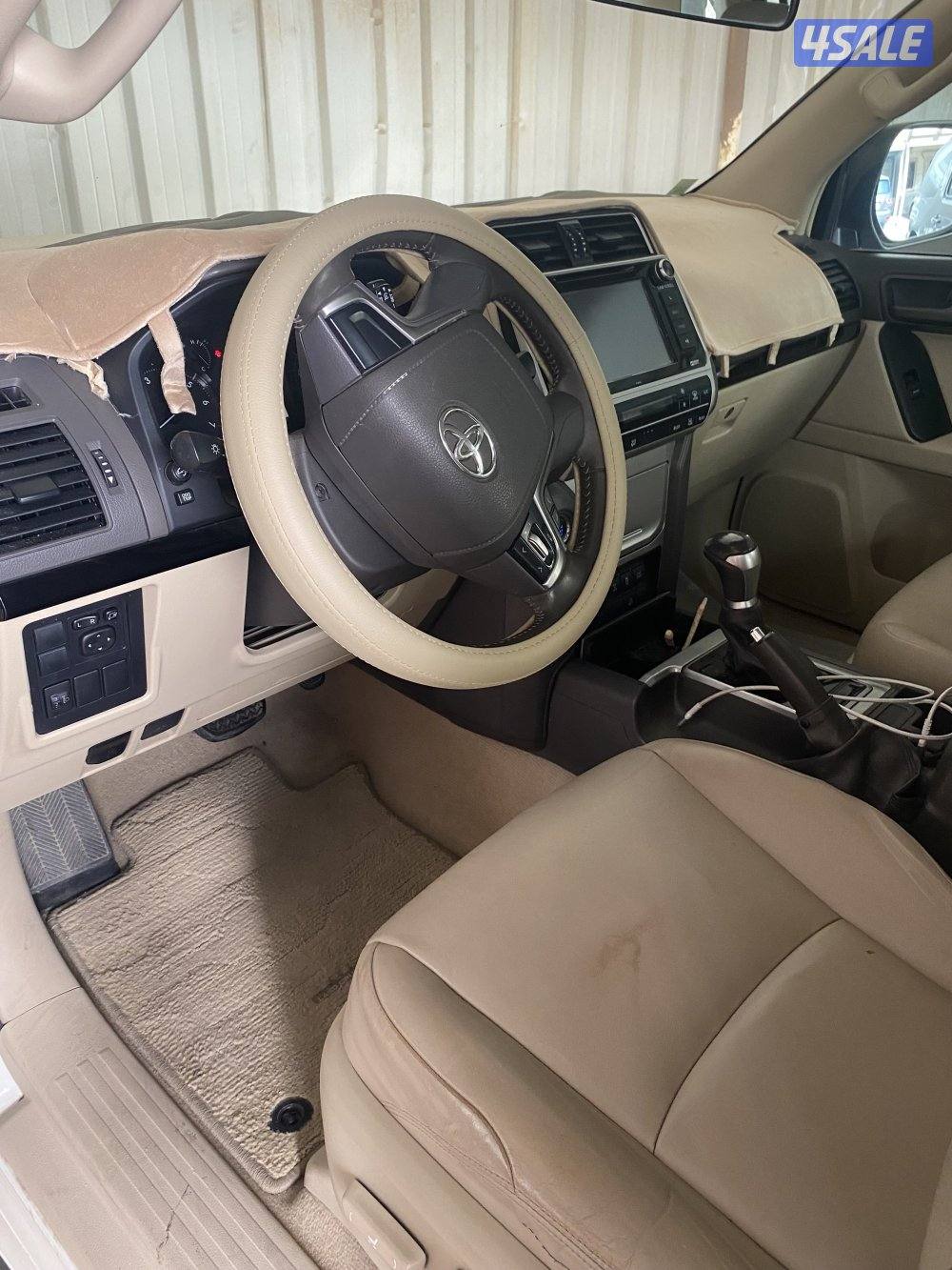 برادو ابيض موديل 2018 ماشي (112000) كم٢ شرط الفحص3