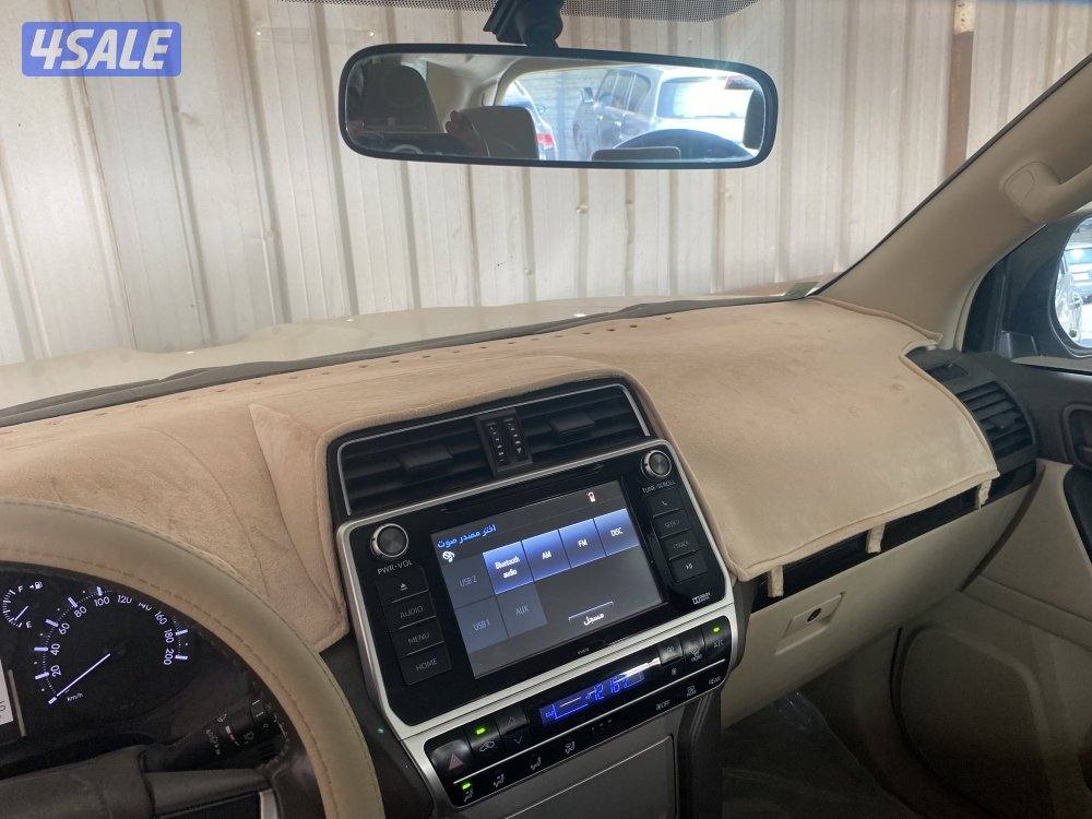 برادو ابيض موديل 2018 ماشي (112000) كم٢ شرط الفحص8