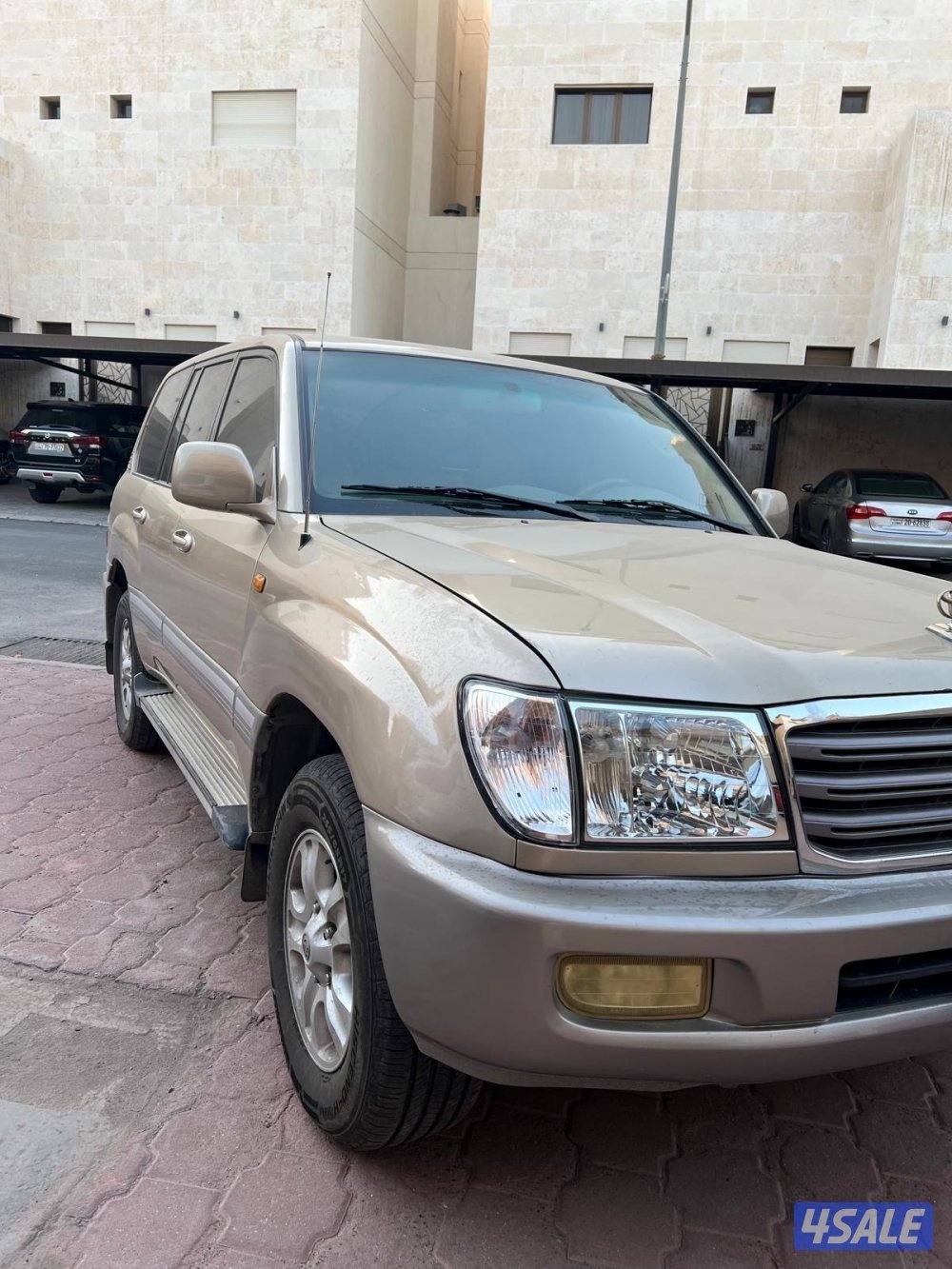 لاندكروز 2003 ذهبي 6 سلندر GXR  ماشي 360 الف1