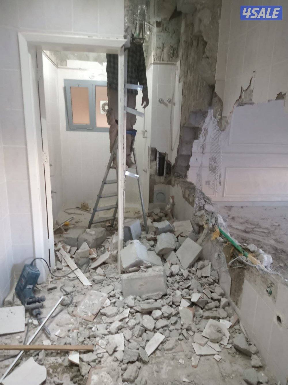 تكسير حمامات ومطابخ تشطيب صحي فتح دريشه فتح باب بارخص الاسعار جرب0