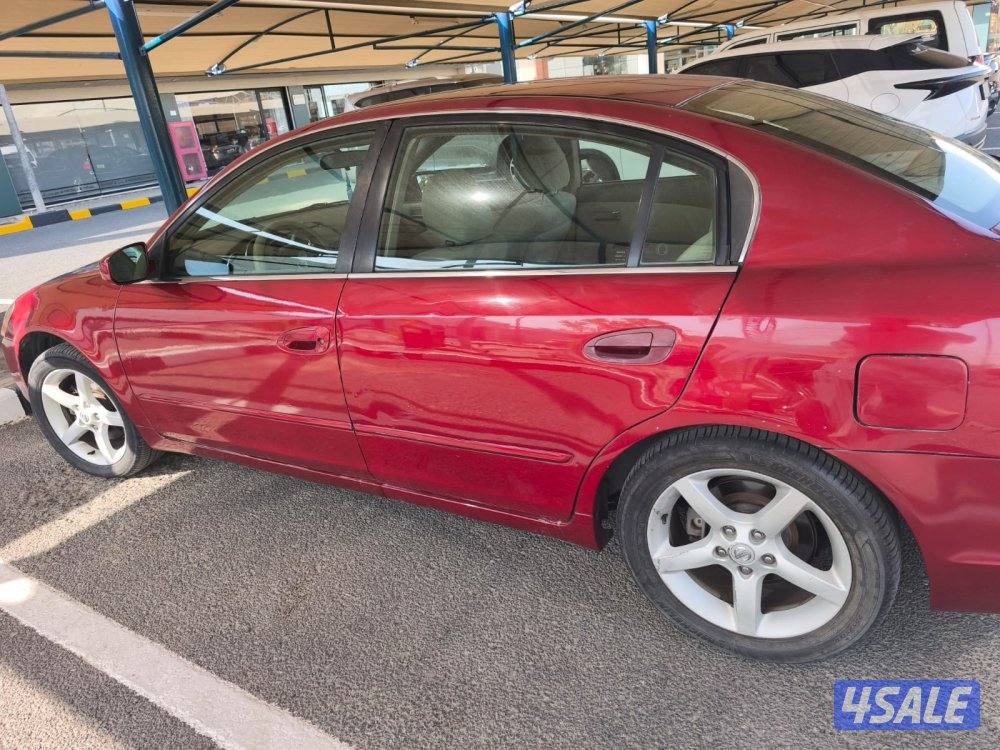 نيسان التيما ٢١٥ ماشية ٤١٠ دينار8