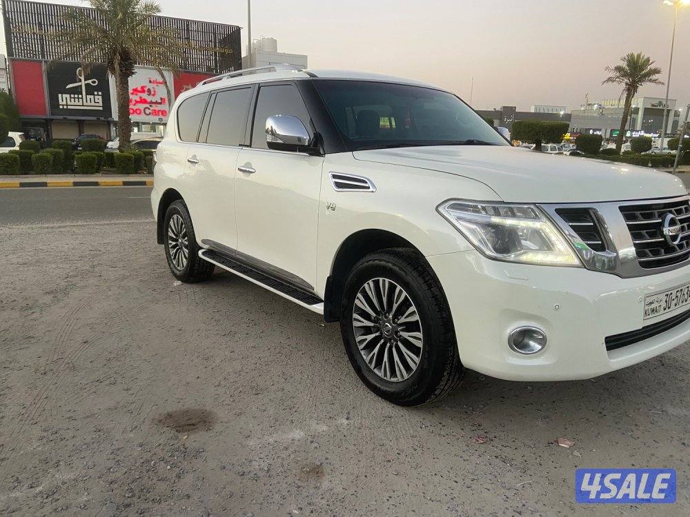 الروضة للبيع نيسان باترول 2015 بلاتينيوم قمة بنظافه داخل تان ممتازه1