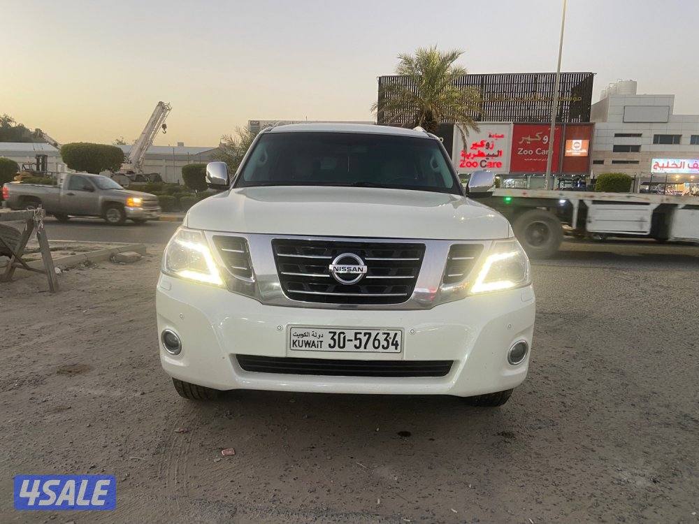 الروضة للبيع نيسان باترول 2015 بلاتينيوم قمة بنظافه داخل تان ممتازه0