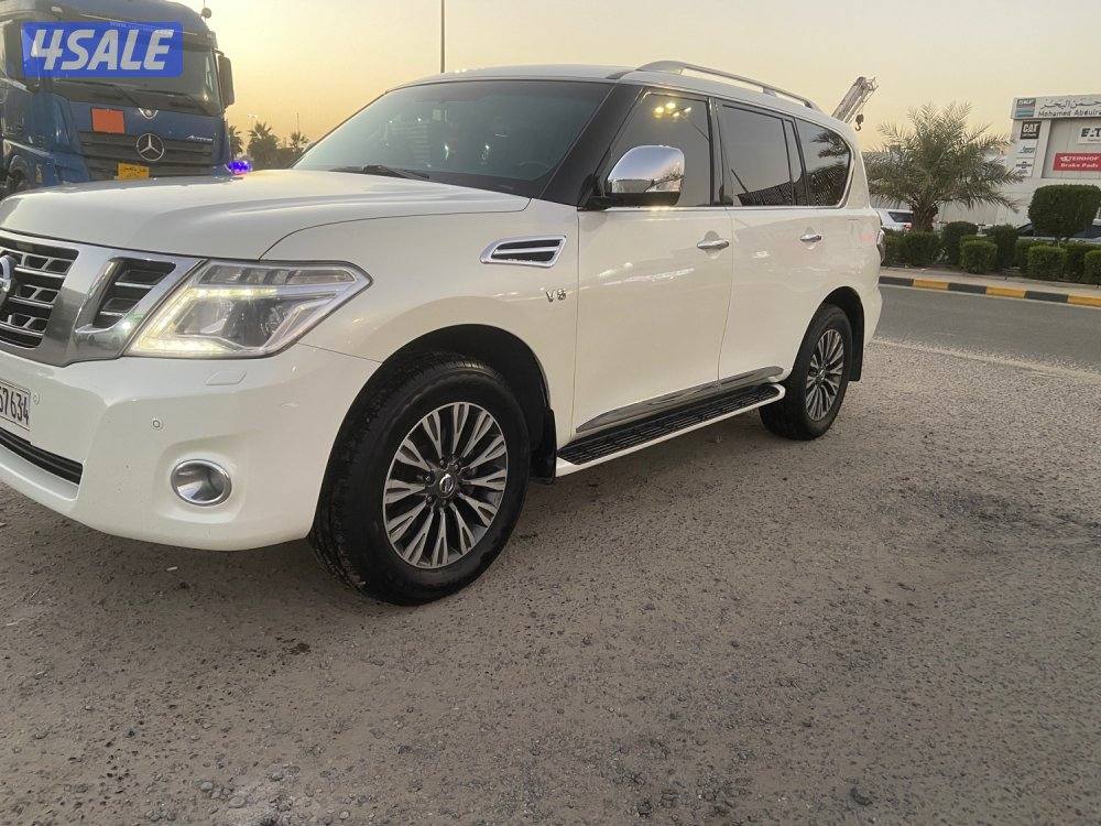 الروضة للبيع نيسان باترول 2015 بلاتينيوم قمة بنظافه داخل تان ممتازه2