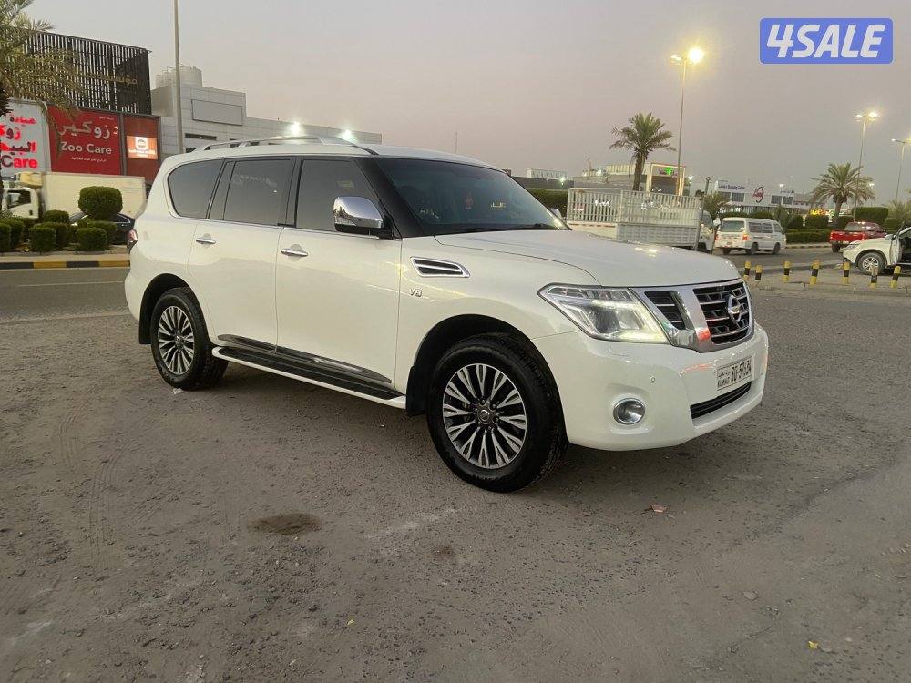 الروضة للبيع نيسان باترول 2015 بلاتينيوم قمة بنظافه داخل تان ممتازه6