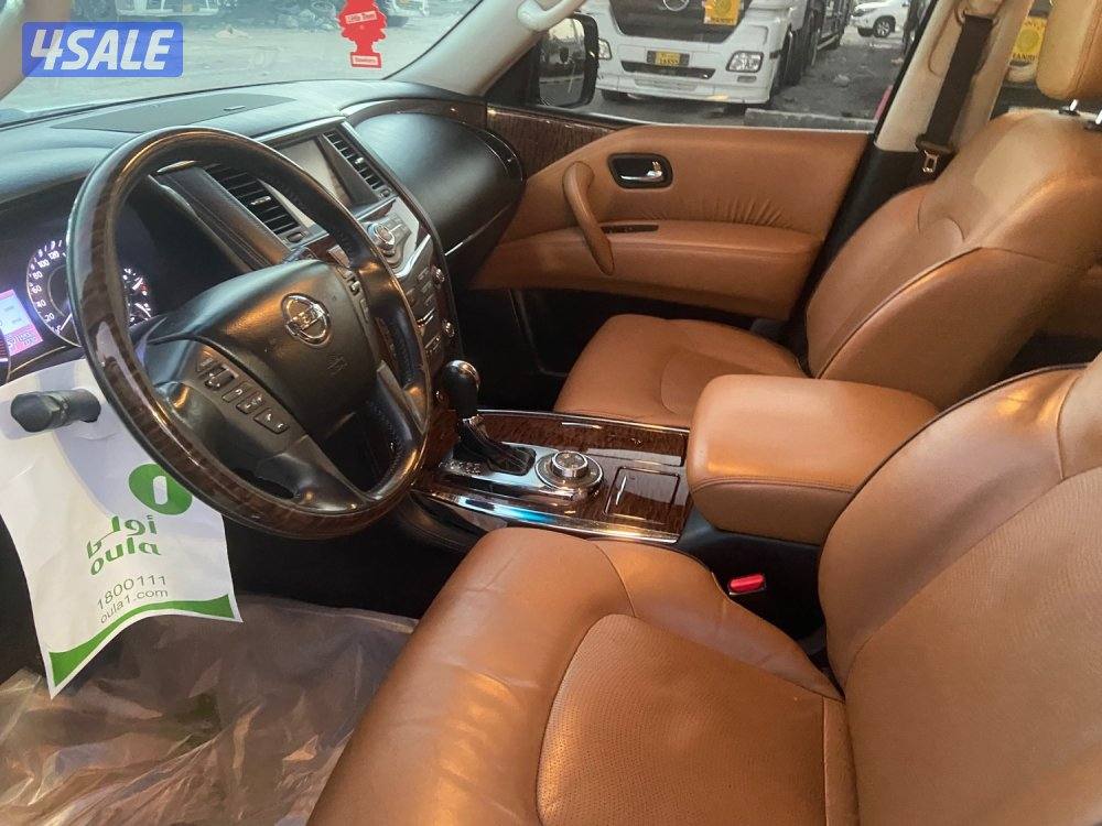 الروضة للبيع نيسان باترول 2015 بلاتينيوم قمة بنظافه داخل تان ممتازه8