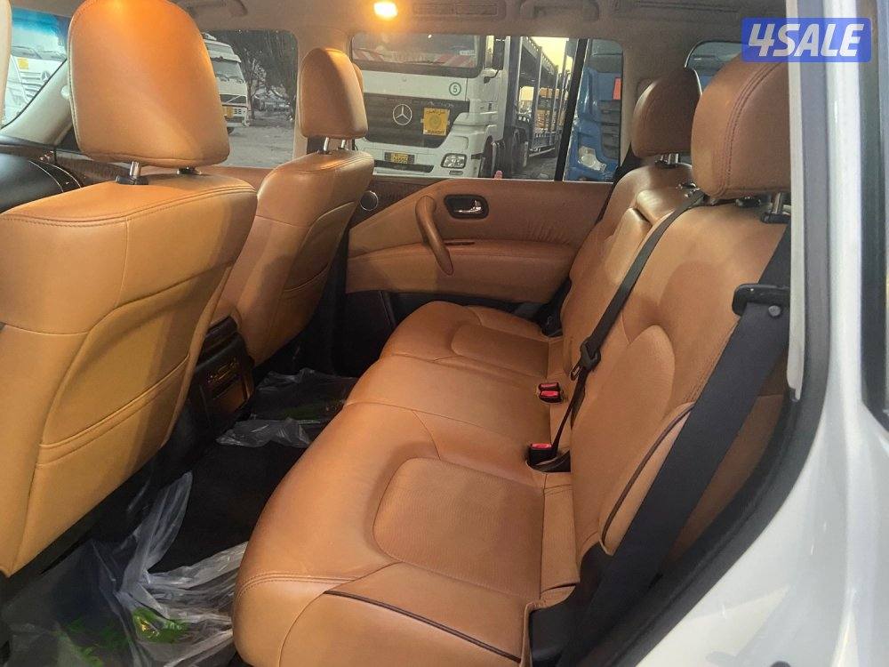 الروضة للبيع نيسان باترول 2015 بلاتينيوم قمة بنظافه داخل تان ممتازه9