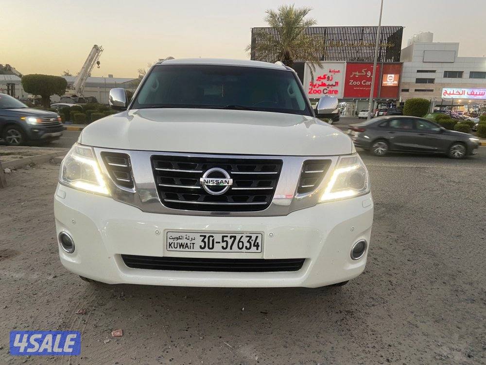 الروضة للبيع نيسان باترول 2015 بلاتينيوم قمة بنظافه داخل تان ممتازه10