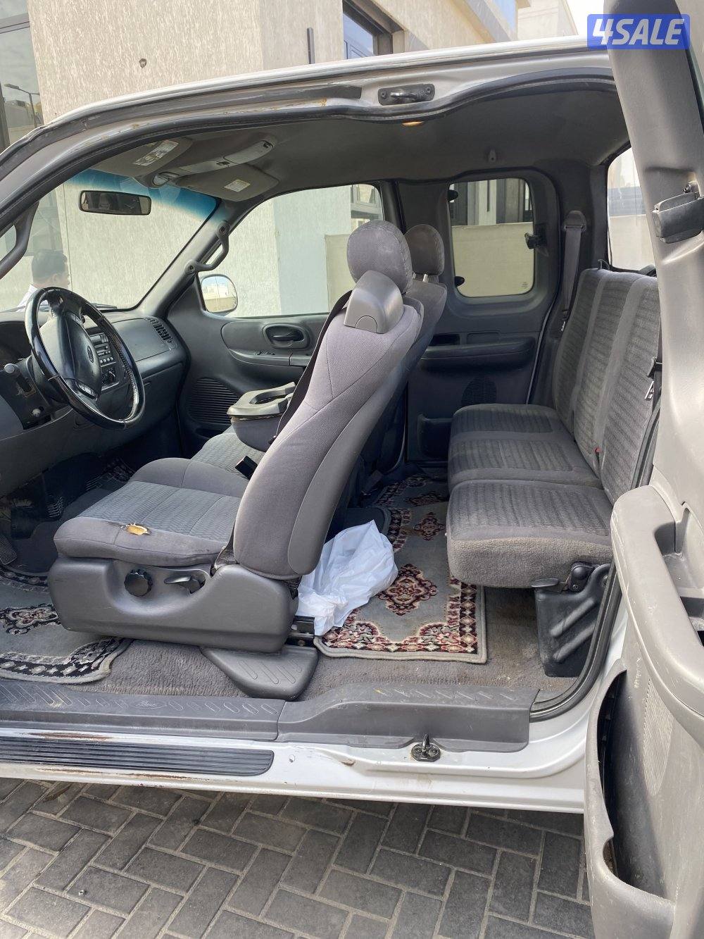 للبيع وانيت فورد مديل ١٠٠٢ لون رصاصي قماره ونص شغال أموره3