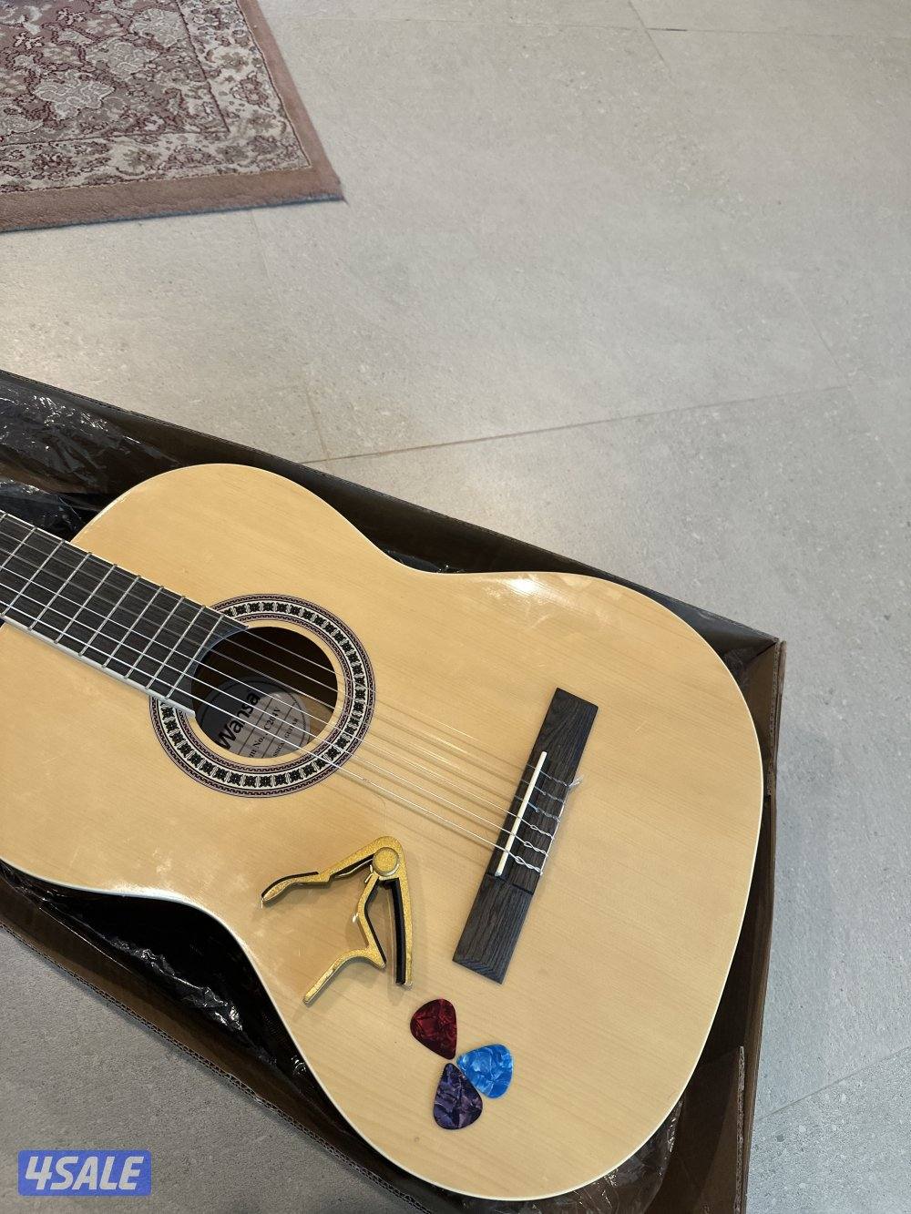 جيتار ونسا  مع اغراض والكرتون جديد رقم التواصل2