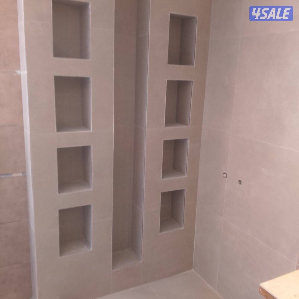 ابو اسماعيل فني تركيب السيراميك الجرانيت والرخام والتكسير والمساح3