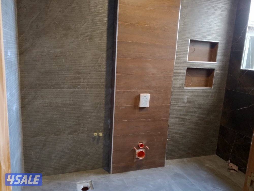 ابو اسماعيل فني تركيب السيراميك الجرانيت والرخام والتكسير والمساح9