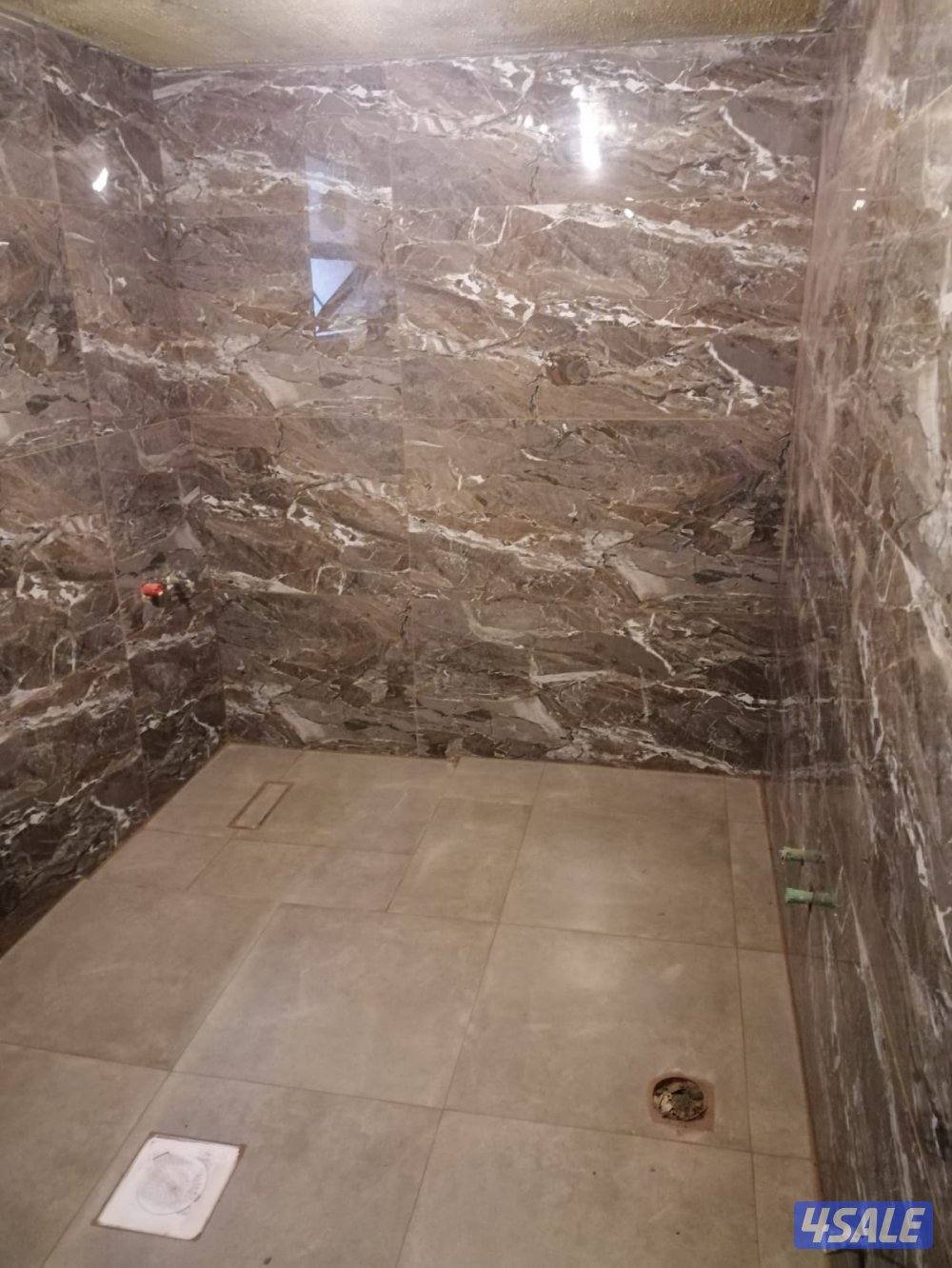 ابو اسماعيل فني تركيب السيراميك الجرانيت والرخام والتكسير والمساح12