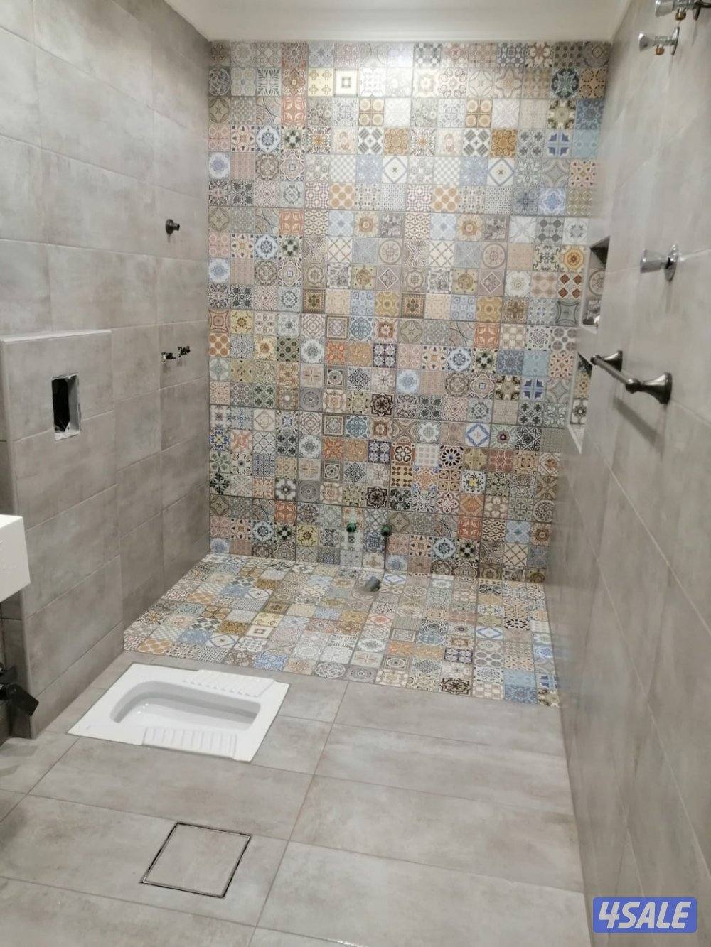 ابو اسماعيل فني تركيب السيراميك الجرانيت والرخام والتكسير والمساح15