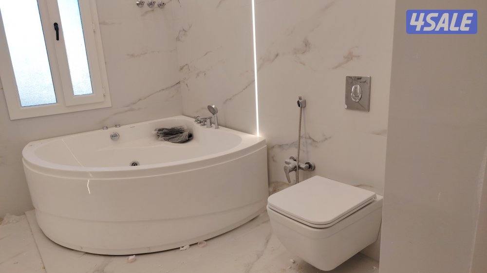 مقاولات صحيه وكهربائيه تكسير وتمديد حمامات وتركيب مضخات ماء وتمديد وعم7