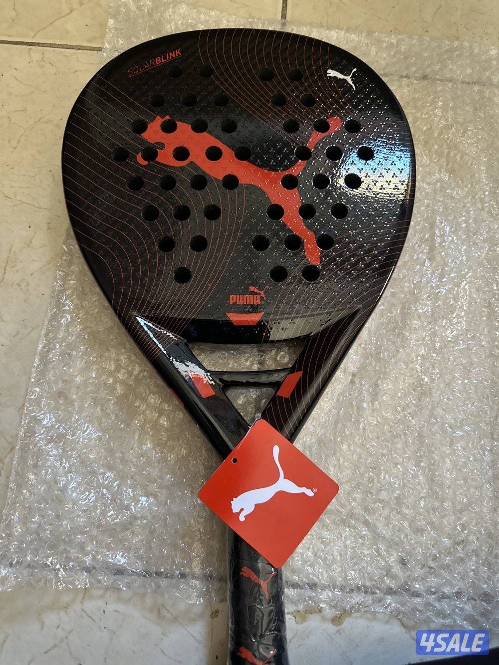 مضرب بادل جديد من نوعية بوما للبيع ومسيوم على 35 دينار قابل للتفاوض2