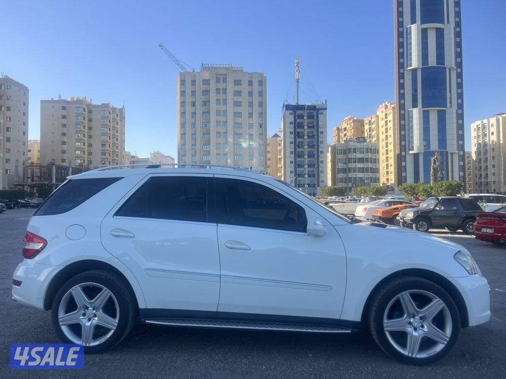 مرسيدس ML350 ابيض 2009 ماشي 230 الف11