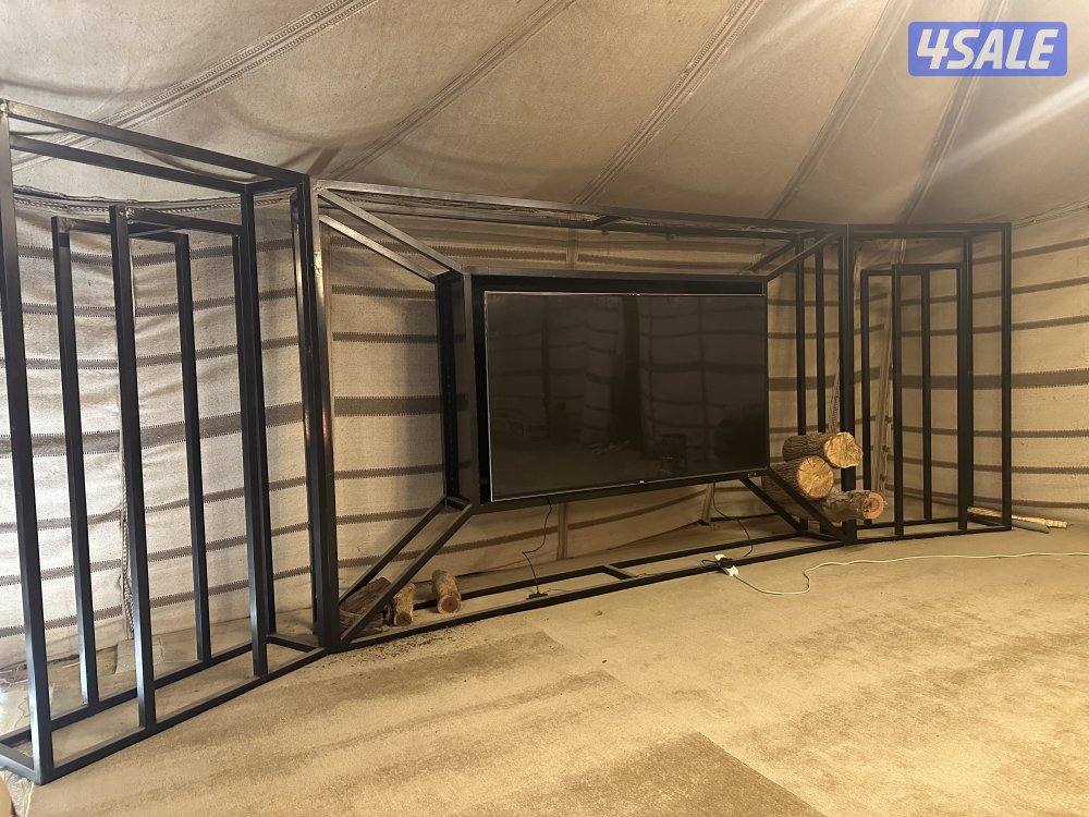 للبيع ستاند حطب مع استاند تلفزيون الطول ٦ متر والارتفاع مترين و ٧٠1