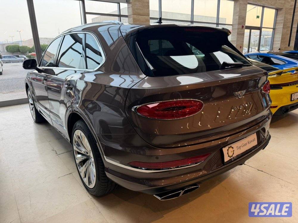 الري بجانب النصر الرياضي توب جير للسيارات2