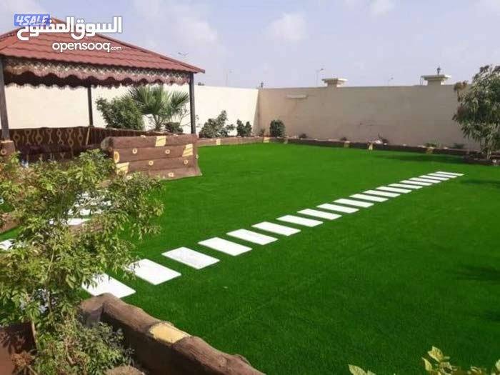 تنسيق حدائق تركيب ثيل صناعي وطبيعي وسور تركي بافضل الاسعار7