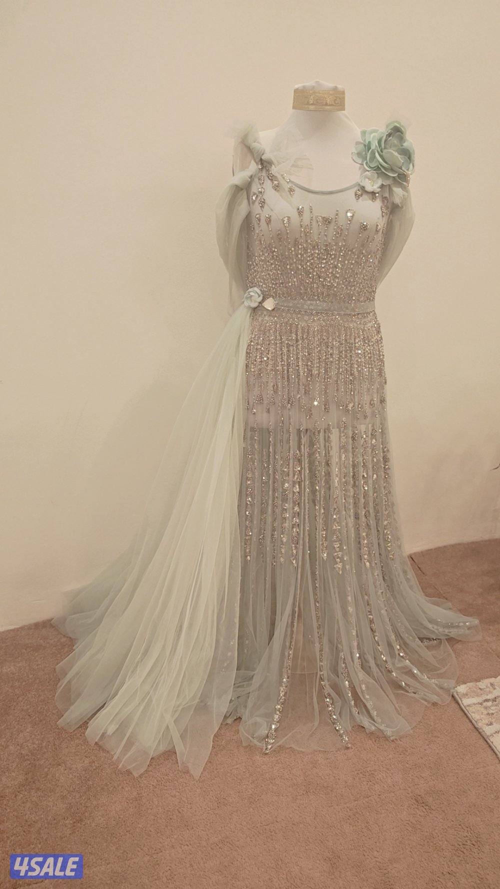 فستان عرس راقي مصنوع من التور ومشكوك بالأحجار والترتر3