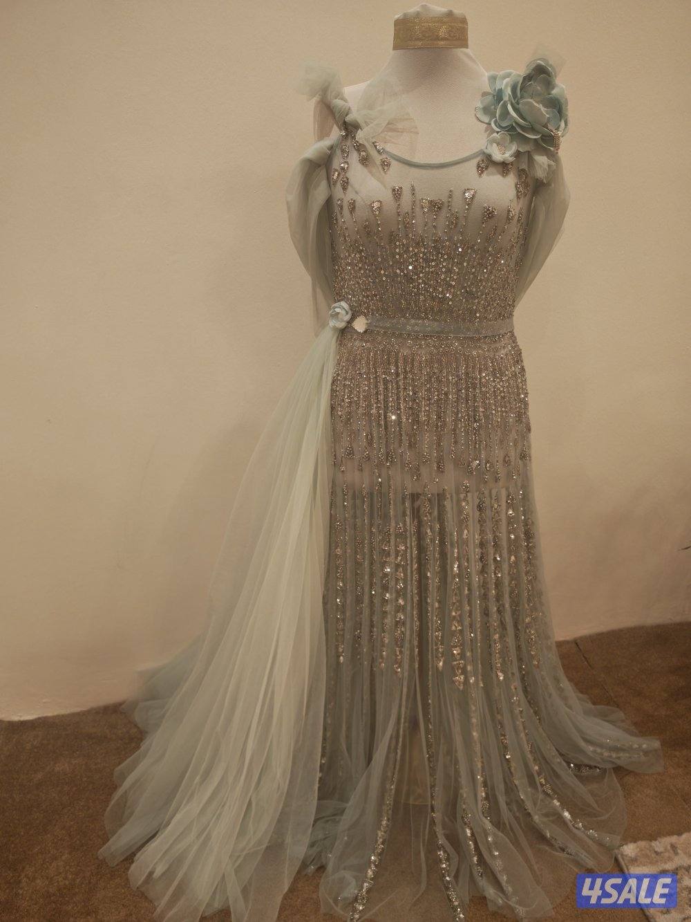 فستان عرس راقي مصنوع من التور ومشكوك بالأحجار والترتر4