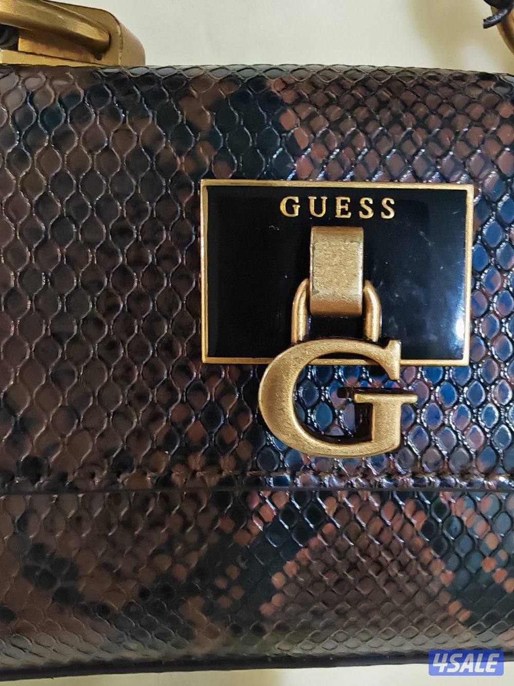 شنطة (جس) شكل جلد الحية لونها جميل2