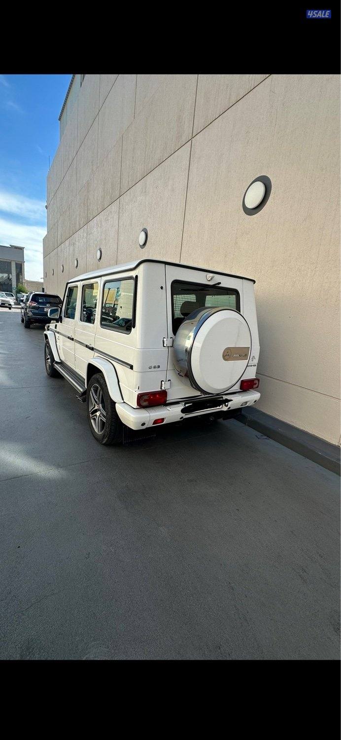 ٢٠٠٥ G500ابيض من داخل بيج تان  ماشي ٣٣٠٠٠٠ البشر صبغ وكاله3