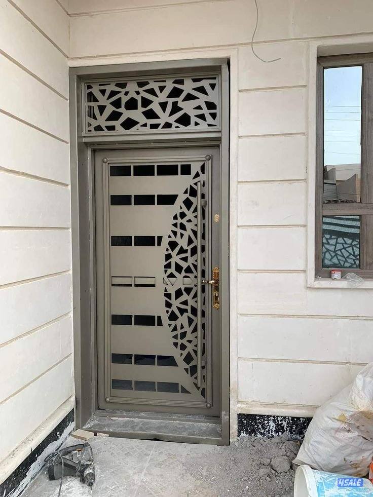 حداد ایراني مظلات سيارات  حديد مشغول ابواب درابزین بديل خشبي ،شبك5