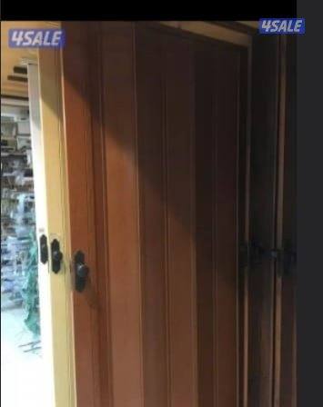 فنى جبسم بورد بارتشن قواطع تقسيم غرفه وصاله حرف ايل باب خشب اكرديون2