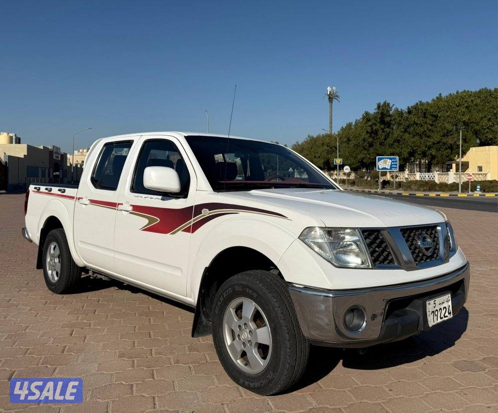 قمة بالنظافة وانيت نيسان نافارا 2010 قير اتوماتيك البابطين صبغ الوكالة1