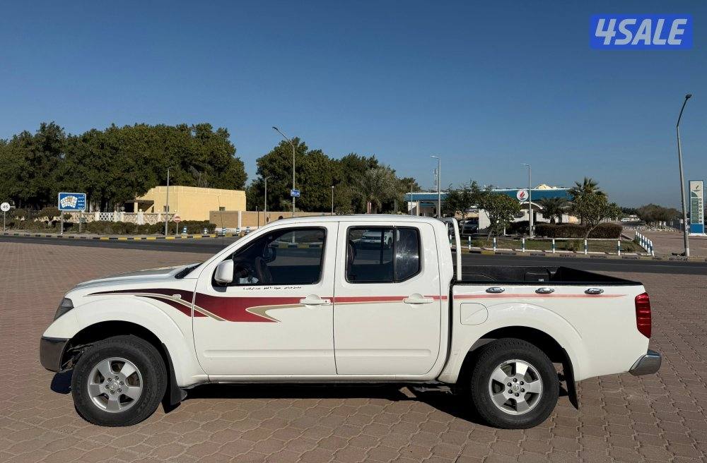 قمة بالنظافة وانيت نيسان نافارا 2010 قير اتوماتيك البابطين صبغ الوكالة3