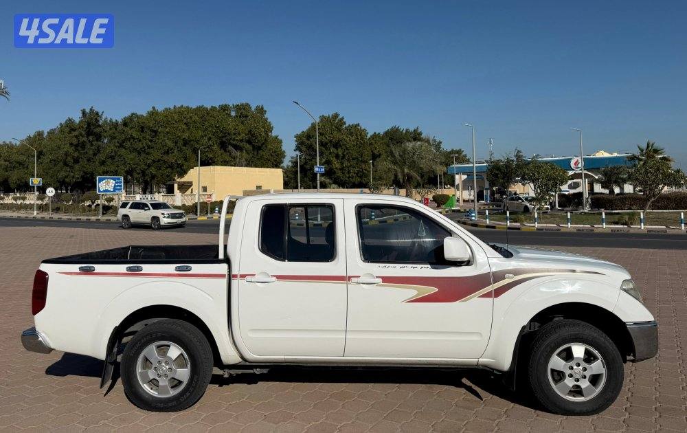 قمة بالنظافة وانيت نيسان نافارا 2010 قير اتوماتيك البابطين صبغ الوكالة5