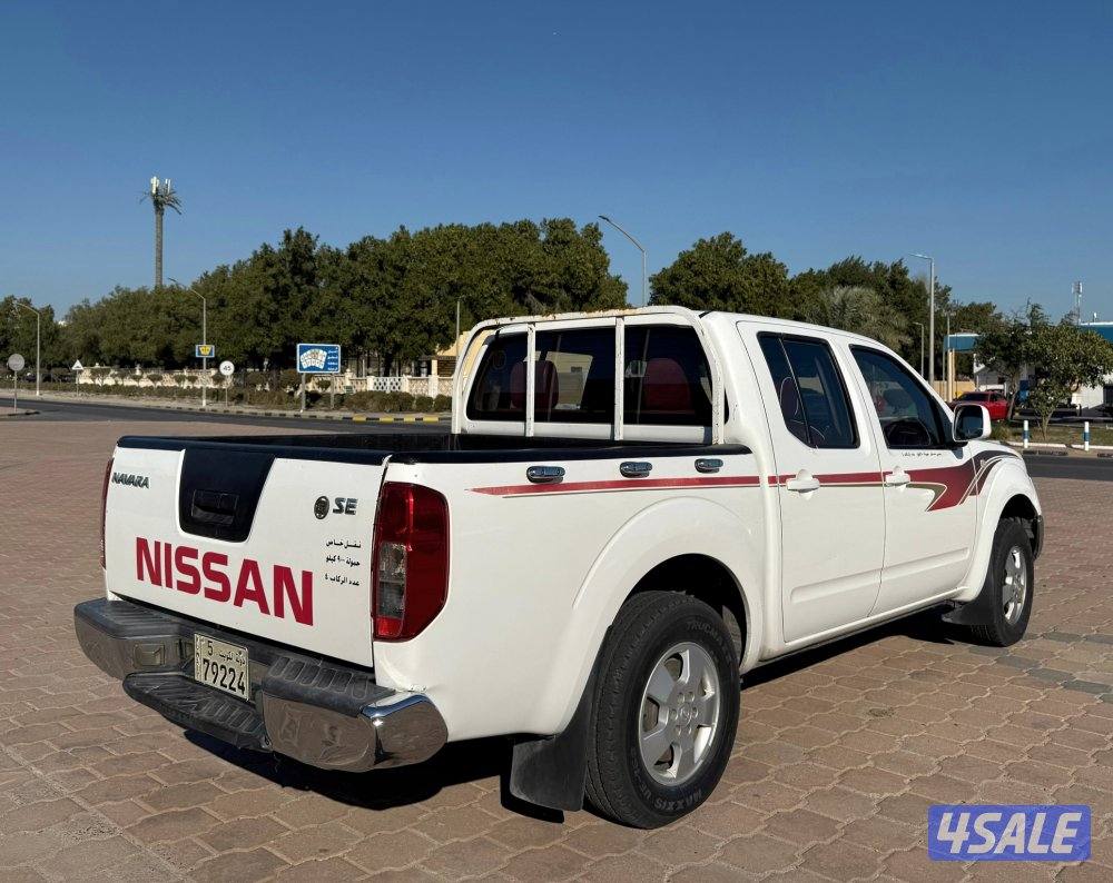 قمة بالنظافة وانيت نيسان نافارا 2010 قير اتوماتيك البابطين صبغ الوكالة6