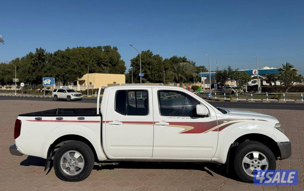 قمة بالنظافة وانيت نيسان نافارا 2010 قير اتوماتيك البابطين صبغ الوكالة14