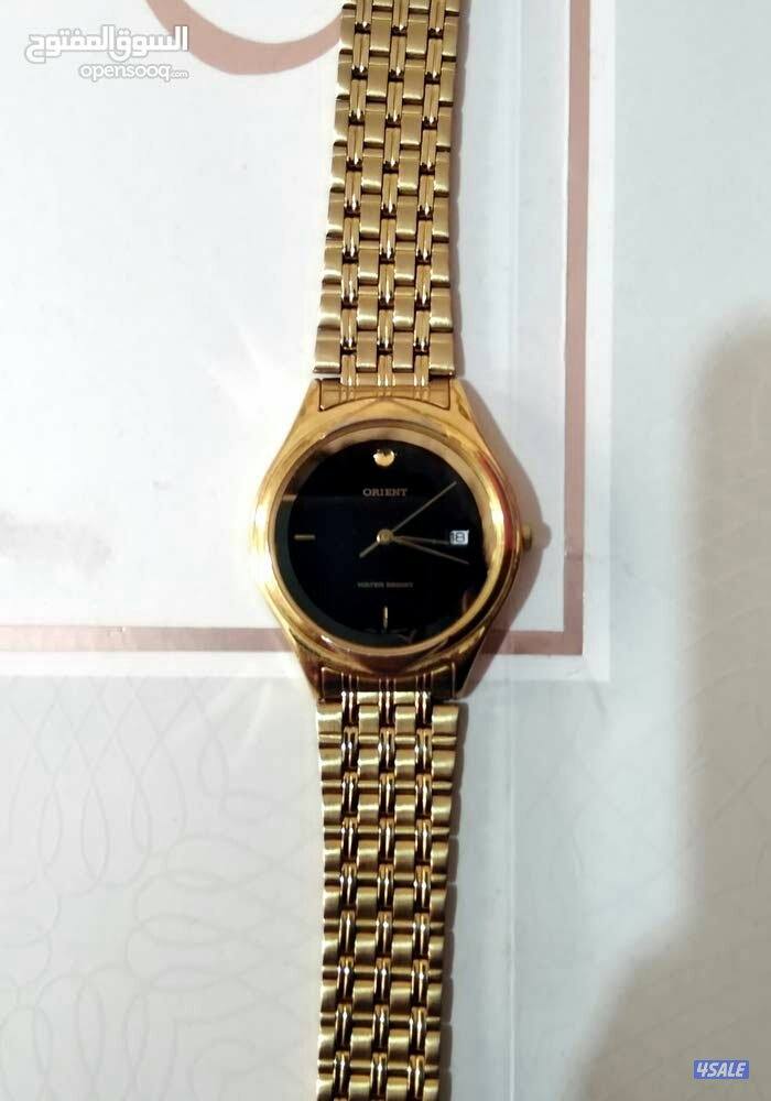ساعه كلاسك ذهبي اورينت اصلي1