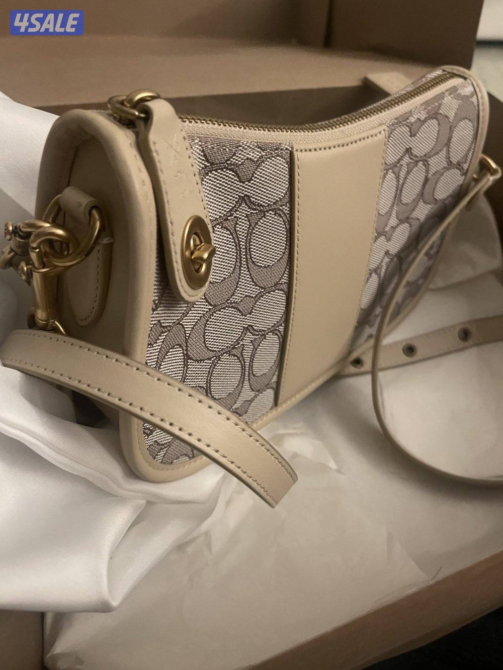 شنطه كوتش اصليه جديده0