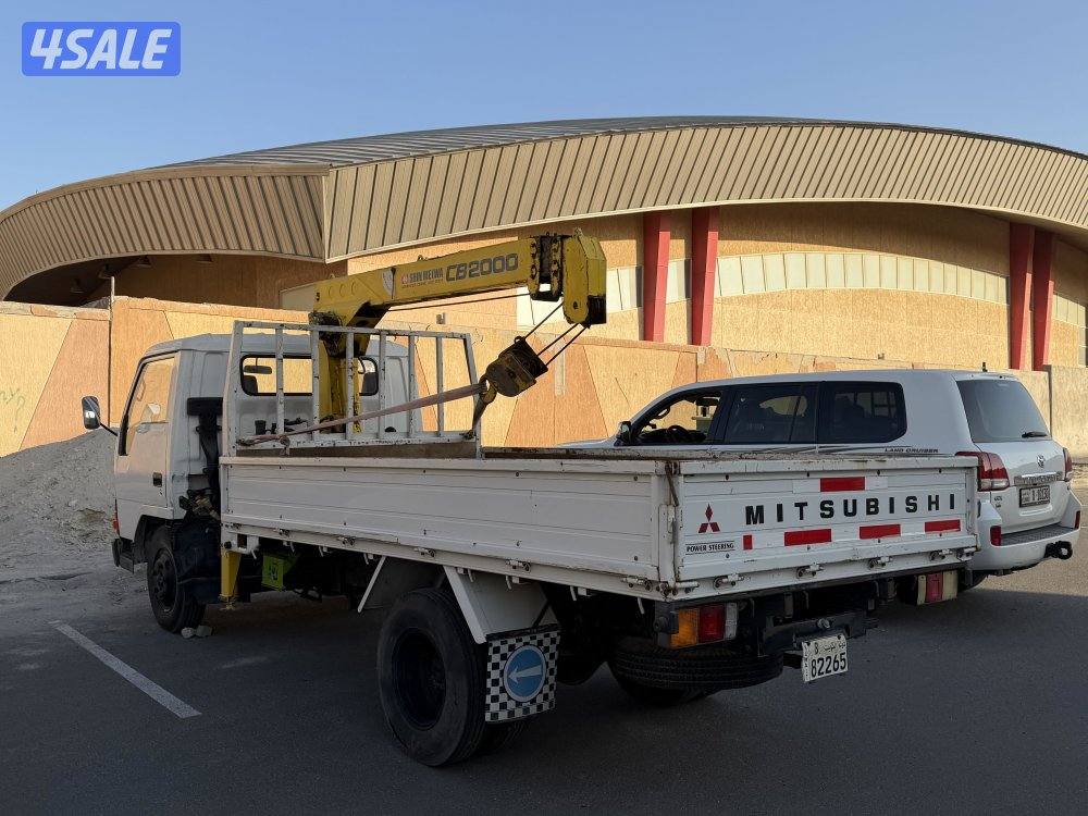 ميتسوبيشي موديل 1992 مخزن عداد قليل 57 الف عليه ونش6