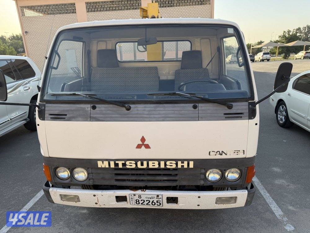ميتسوبيشي موديل 1992 مخزن عداد قليل 57 الف عليه ونش7
