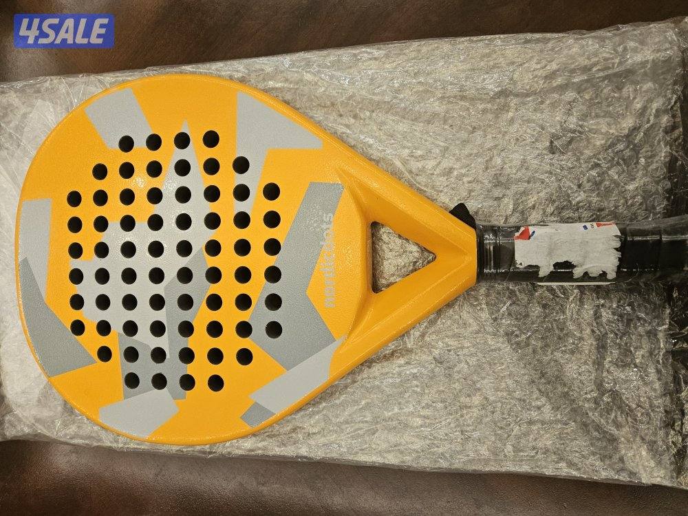 مضرب بادل جديد لم يستخدم من nordicdots. لون البرتقالي2