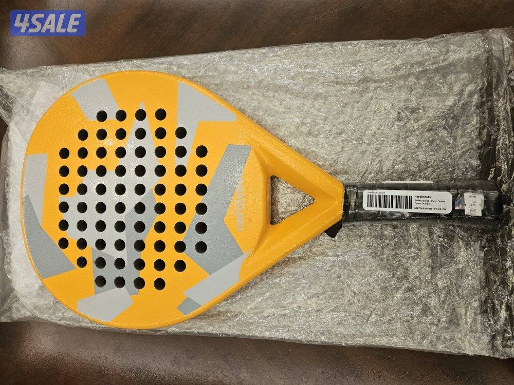 مضرب بادل جديد لم يستخدم من nordicdots. لون البرتقالي3