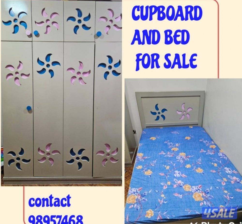 bed and cupboard for sale0