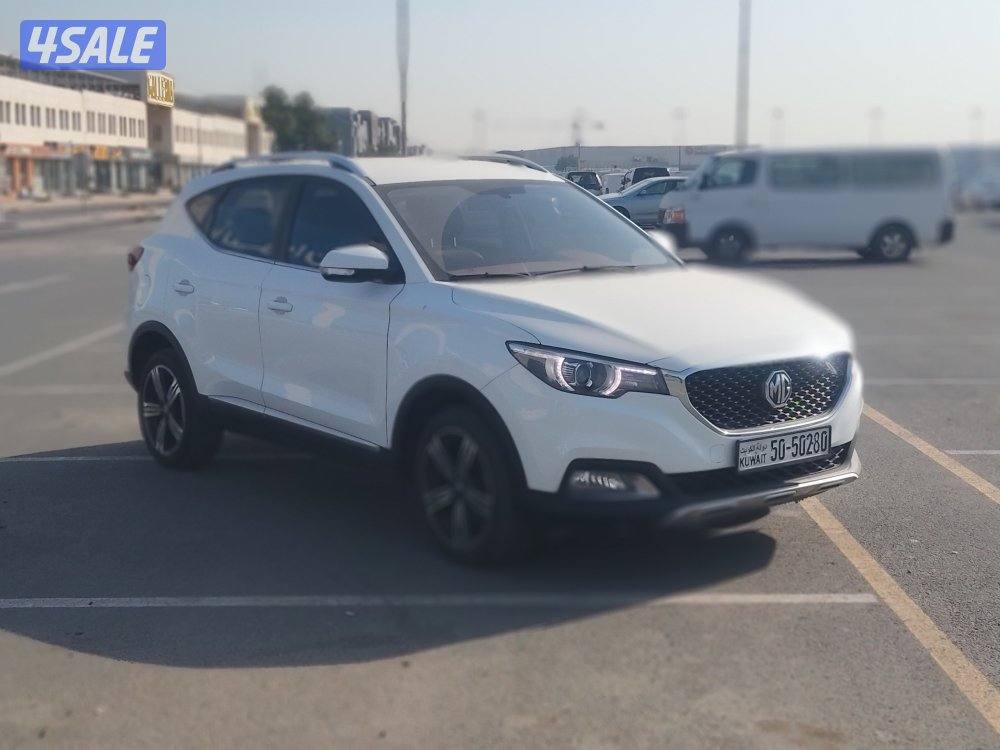 ام جي زد اكس تي موديل 2019 لون ابيض عداد 130 الف بحاله ممتازة شاشة2