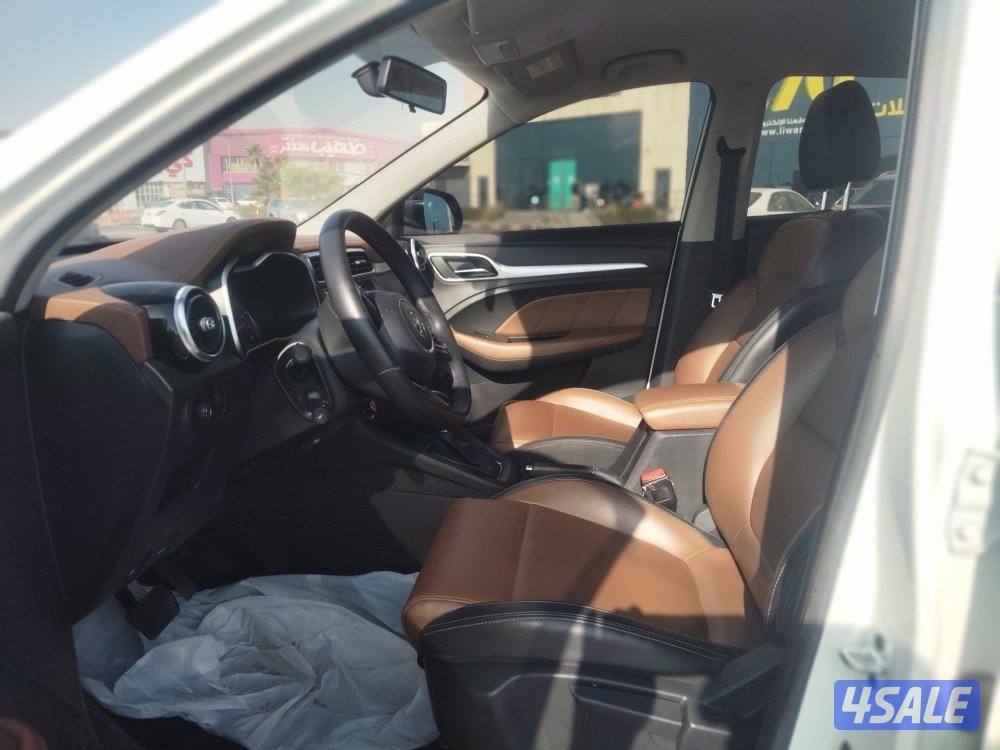 ام جي زد اكس تي موديل 2019 لون ابيض عداد 130 الف بحاله ممتازة شاشة6