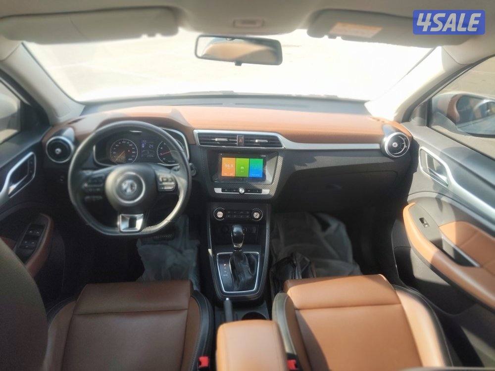 ام جي زد اكس تي موديل 2019 لون ابيض عداد 130 الف بحاله ممتازة شاشة7